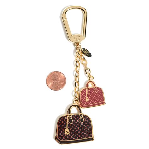 louis vuitton mascot black|louis vuitton handbag charms.